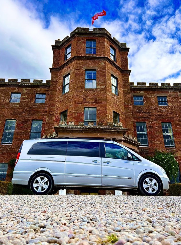 Mercedes V-Class aptly in front of historic luxury house